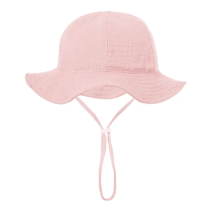 pink bucket hat on a white background