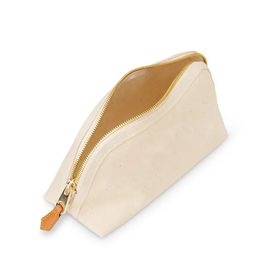 Beige cosmetic bag with gold zipper on a white background