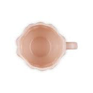 Pink ceramic mug on a white background