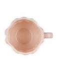 Pink ceramic mug on a white background