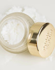 poppy and pout lip scrub with gold top open and marshmallow white lip scrub visible