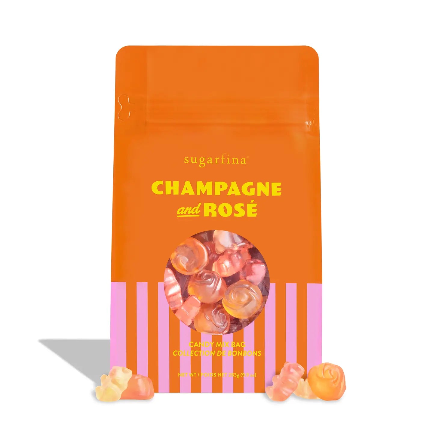 Sugarlina Champagne and Rosé gummy candy in a bright orange stand-up pouch with pink vertical stripes at the bottom and a clear window showing the gummies inside. A few gummies are placed in front of the bag on a white background.