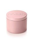 Pink cylindrical container with 'Apotheke' branding on a white background