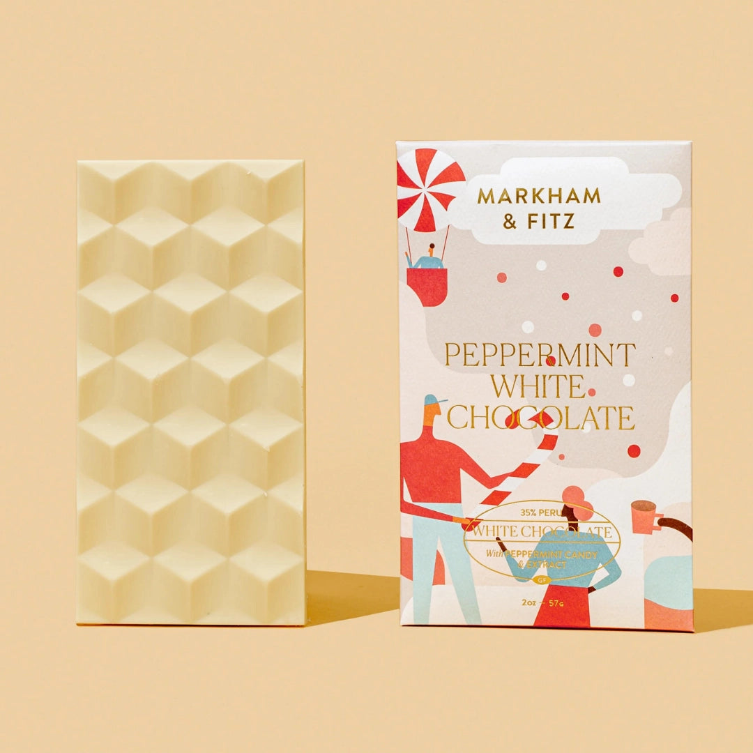 Markham & Fitz peppermint white chocolate packaging on a beige background