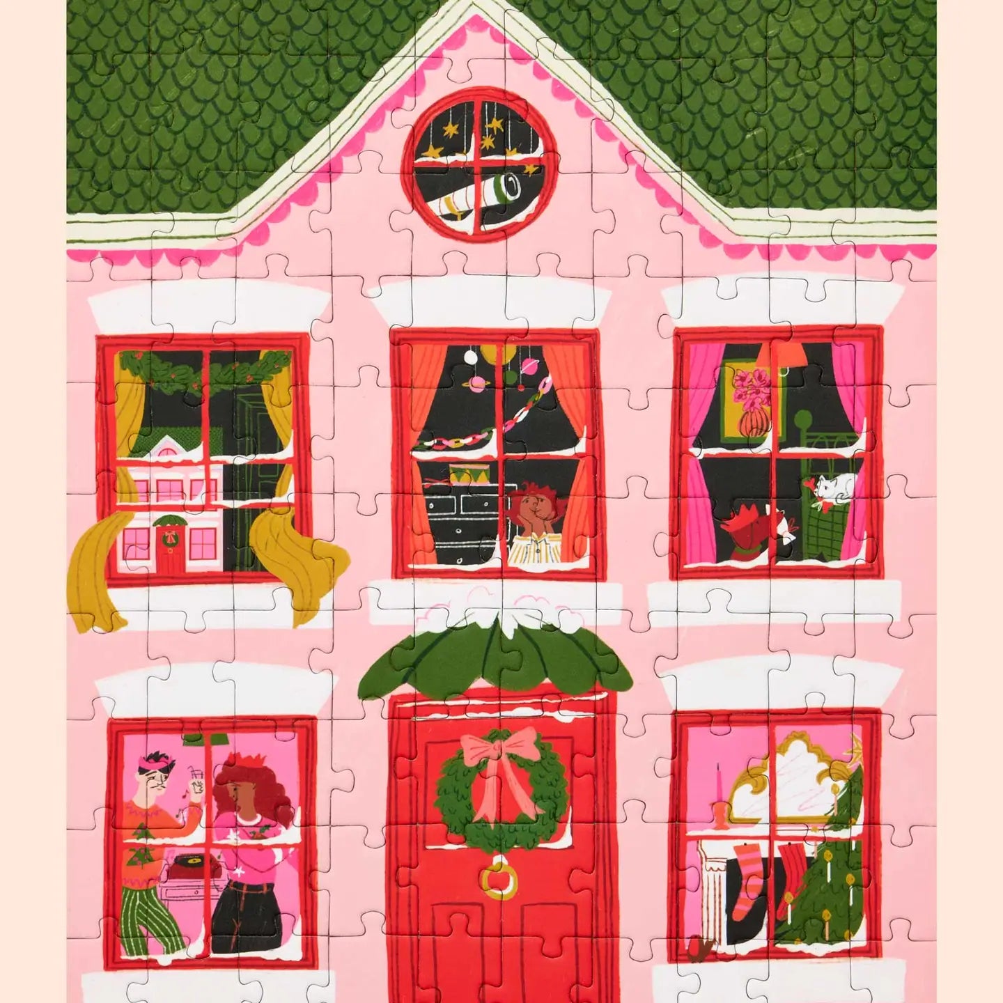 Puzzle of a pink house with windows and a door, featuring Christmas decorations.
