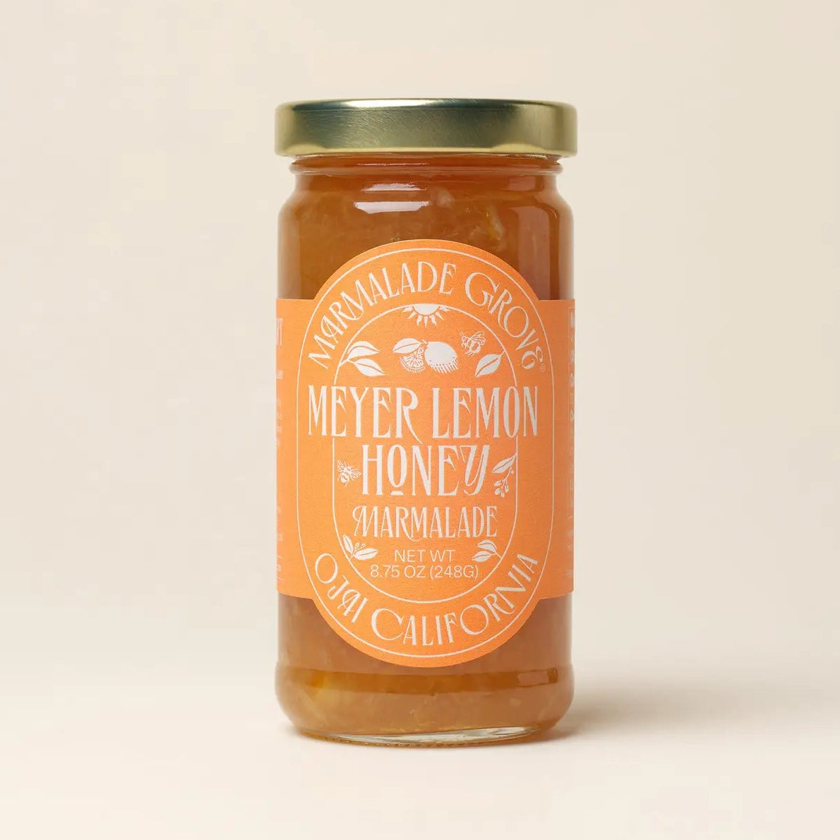 meyer lemon marmalade on a plain background