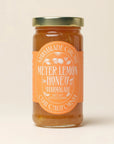 meyer lemon marmalade on a plain background