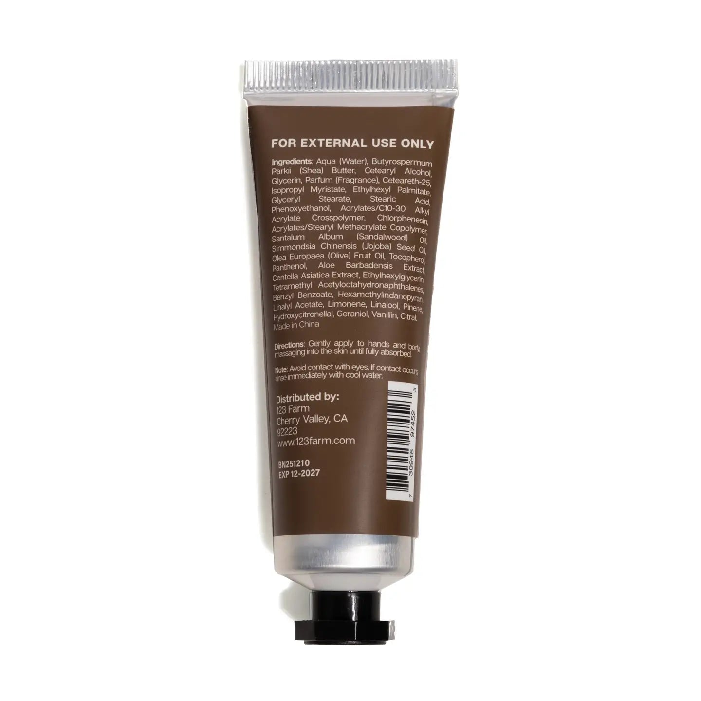 Hand cream tube with label on a white background
