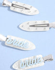 bridal clips on a blue background