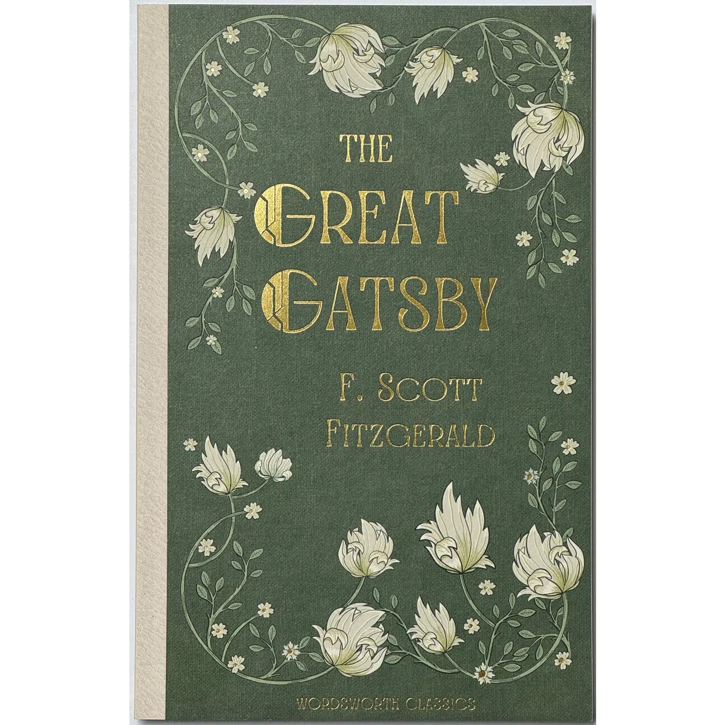 Book cover of 'The Great Gatsby' by F. Scott Fitzgerald with floral design on a green background