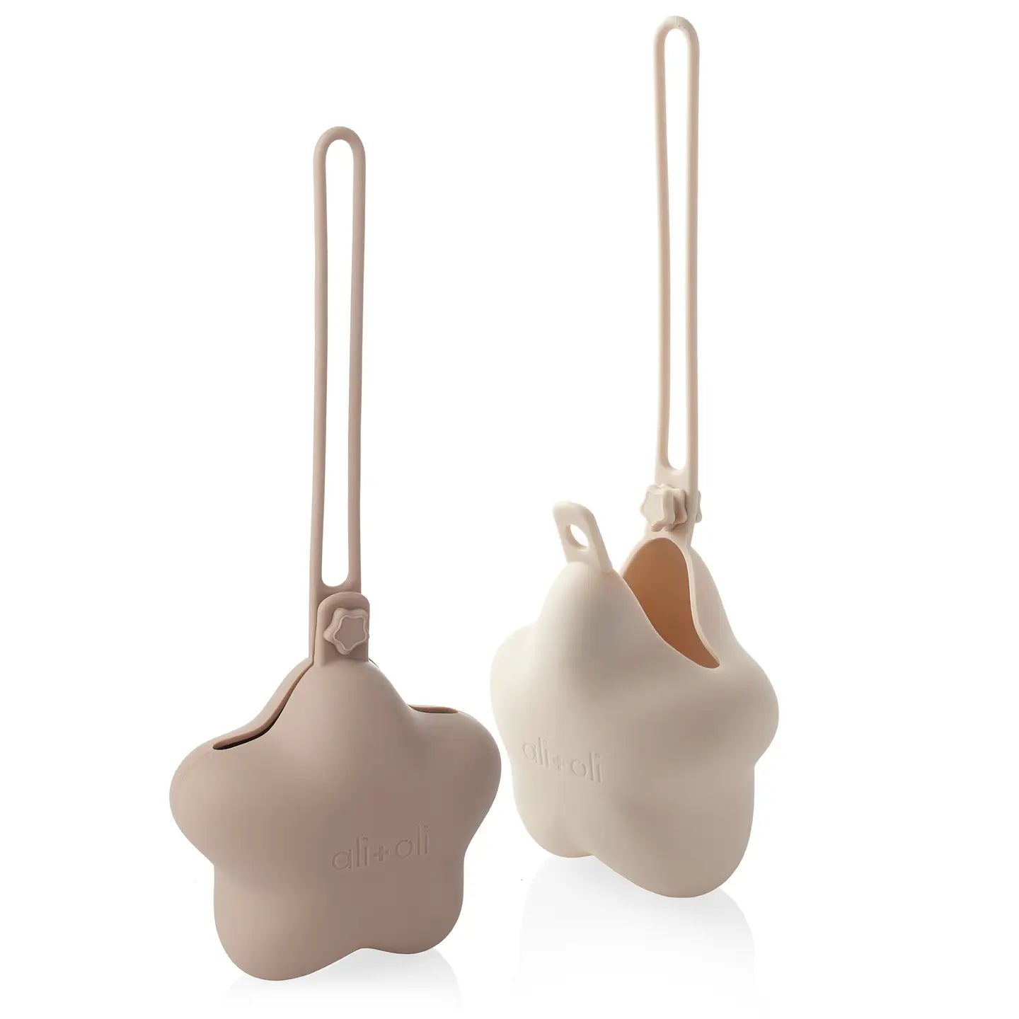 Two silicone dog toys with handles, one star-shaped and one round, on a white background.