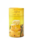 yellow cylinder with gold text on the top. has picture of bear gummy sitting on top of pineapple