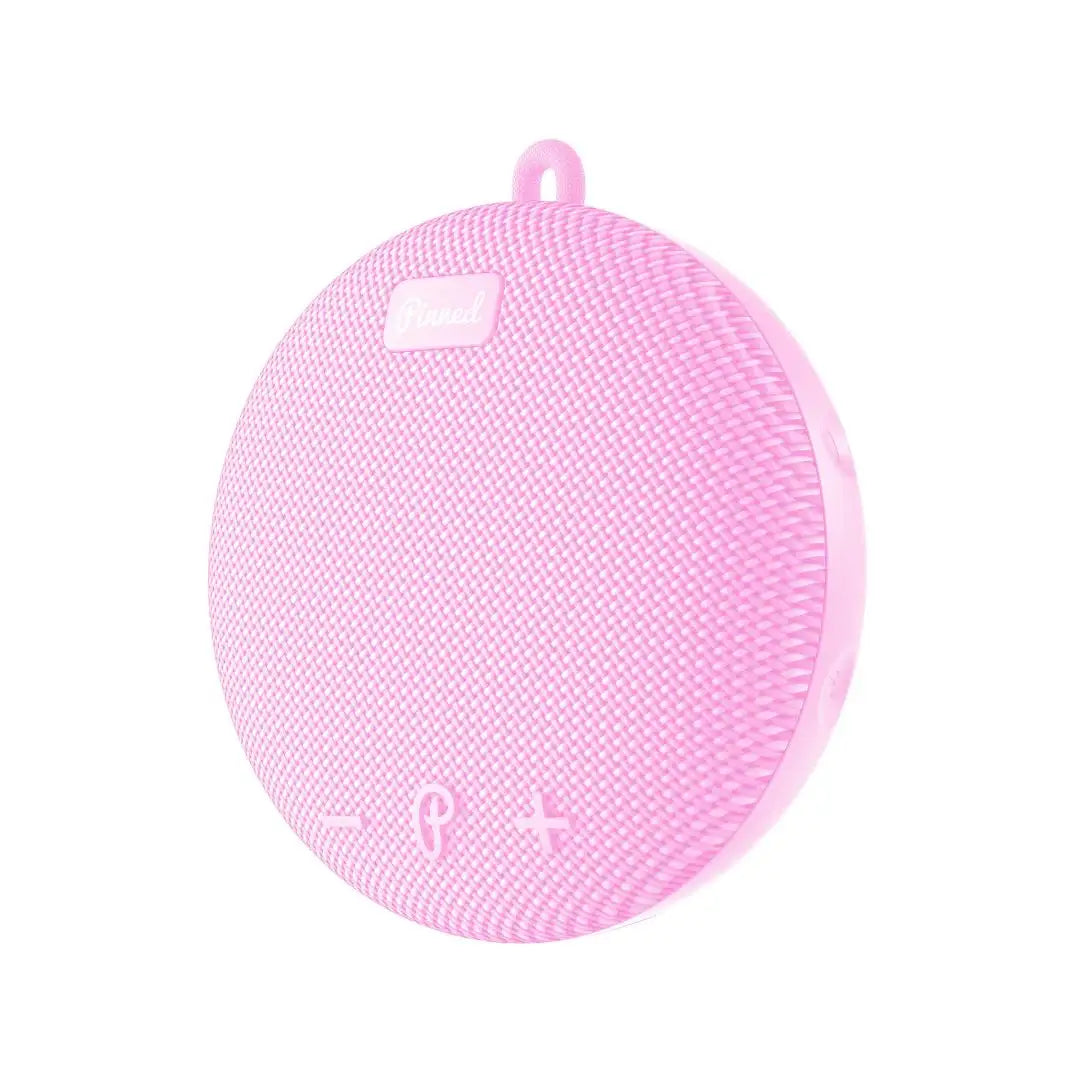 Pink silicone cleaning ball on a white background