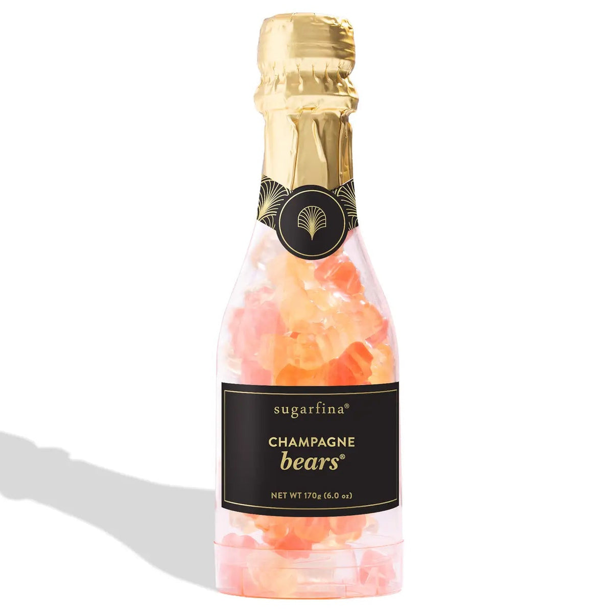 Sugarfina Champagne Bears candy in a clear glass bottle with a gold foil neck wrap and a black label, shown on a white background with a soft shadow.