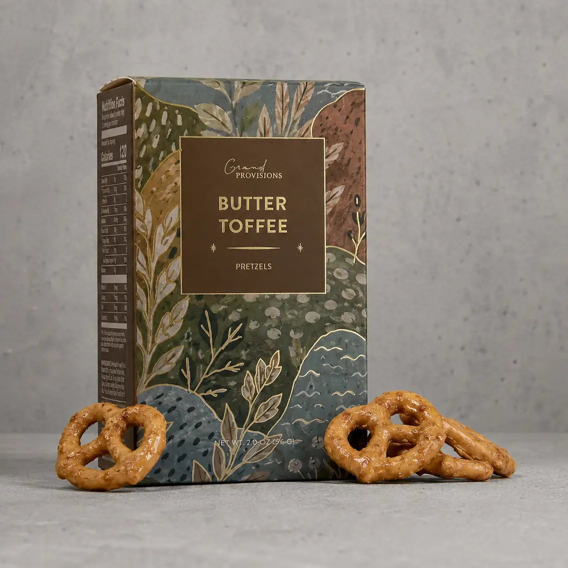 Butter toffee pretzels on a grey background