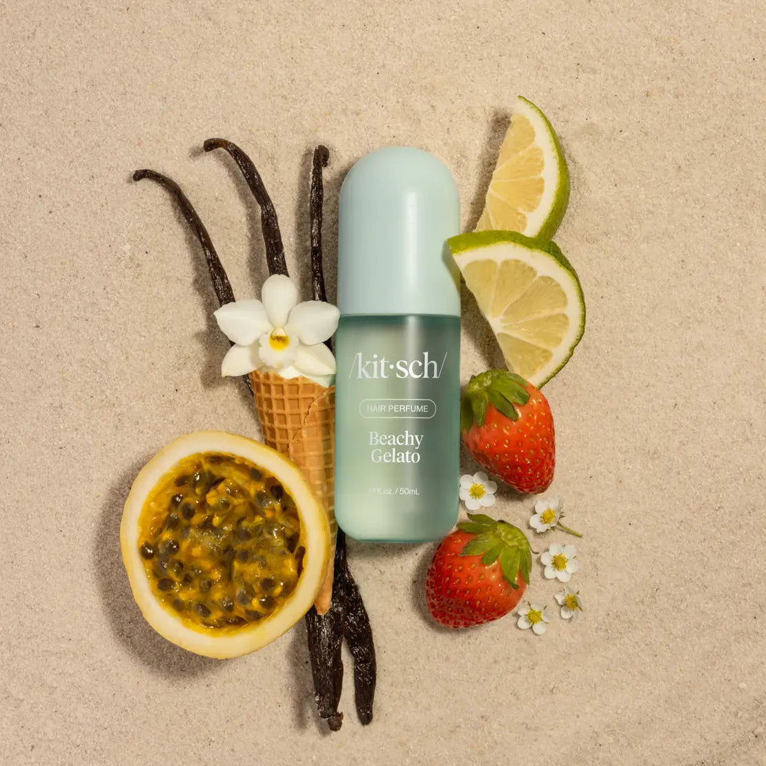 Kitsch product with vanilla beans, lemon slices, strawberries, and a flower on a beige background