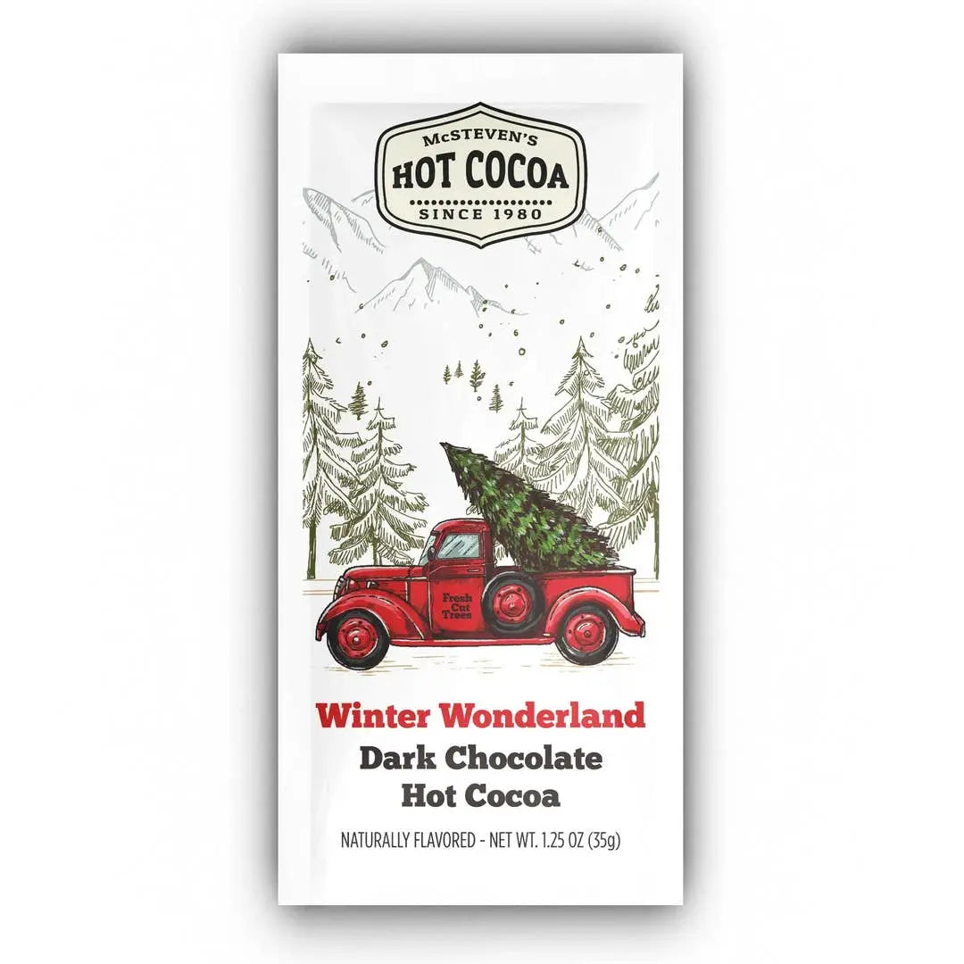 Hot chocolate package with a red truck and Christmas trees on a white background