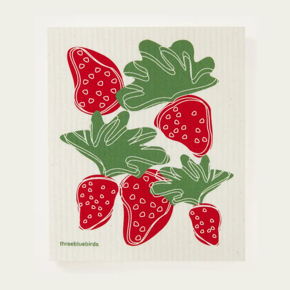 Dishcloth with red strawberries and green leaves on a white background