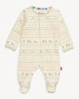 Baby onesie with forest pattern on a white background