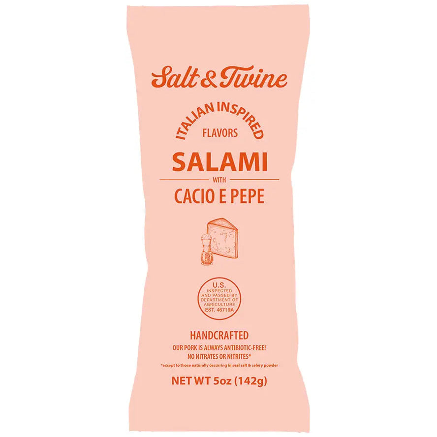 Pink package of Salt & Twine Salami with Cacio e Pepe on a white background
