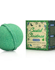 Green bath bomb with 'Coastal Christmas' packaging on a white background