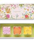 sugarfina candy box with floral design and three candy packages inside