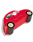 A red Christmas-themed car-shaped gift box with illustrations of Santa Claus, a tree, and gold lettering that reads 'happy holidays' on a white background.
