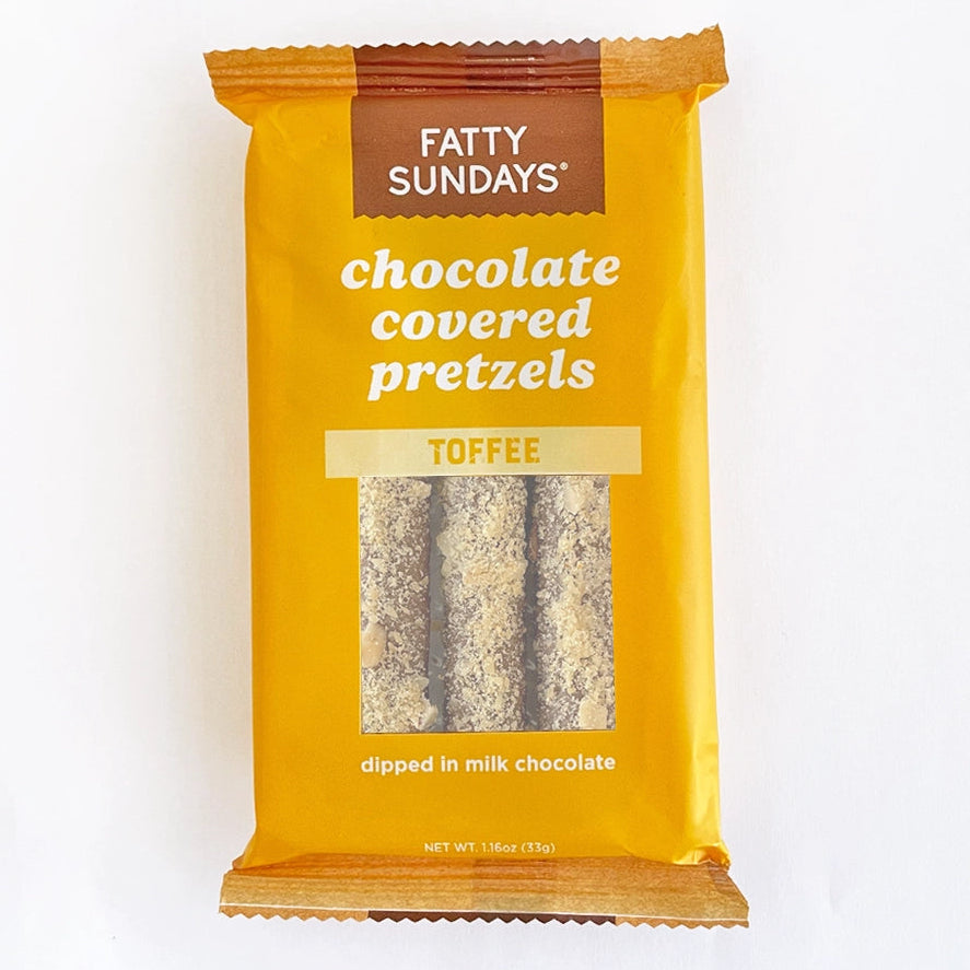 Packaged chocolate-covered pretzels with Fatty Sundays branding on a white background