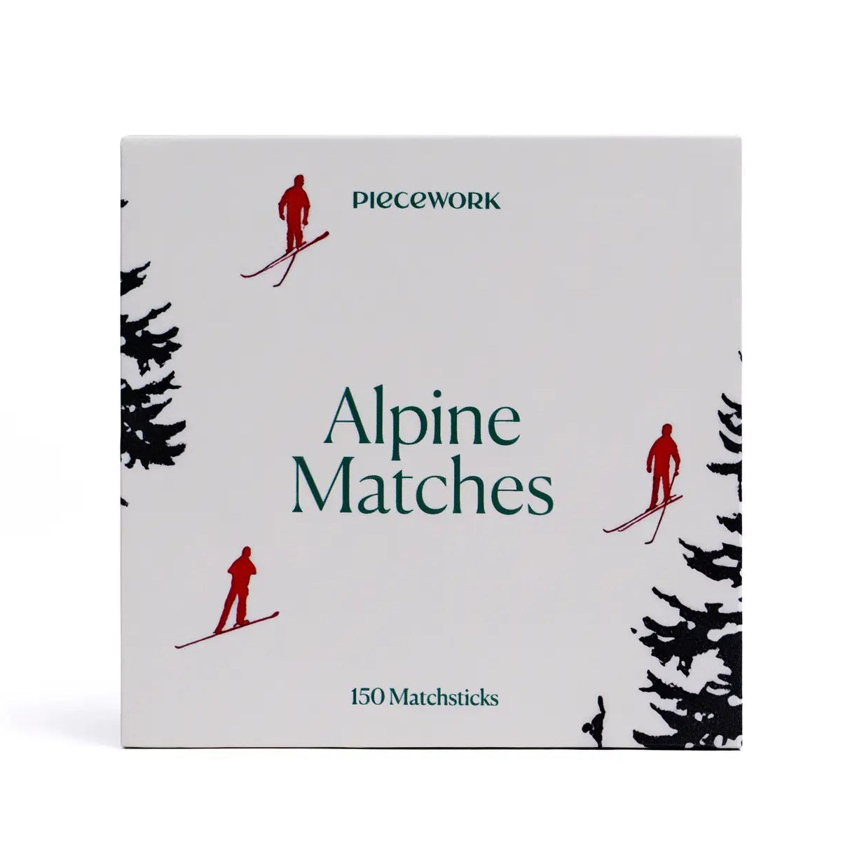 Box of 'Alpine Matches' by Piecework with skier illustrations on a white background
