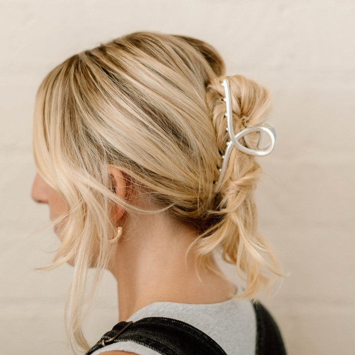 silver loop hair clip in blonde hair