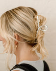 silver loop hair clip in blonde hair