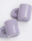 2 thick purple ceramic mugs