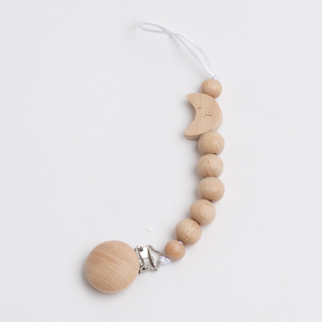 Wooden teether clip with moon.