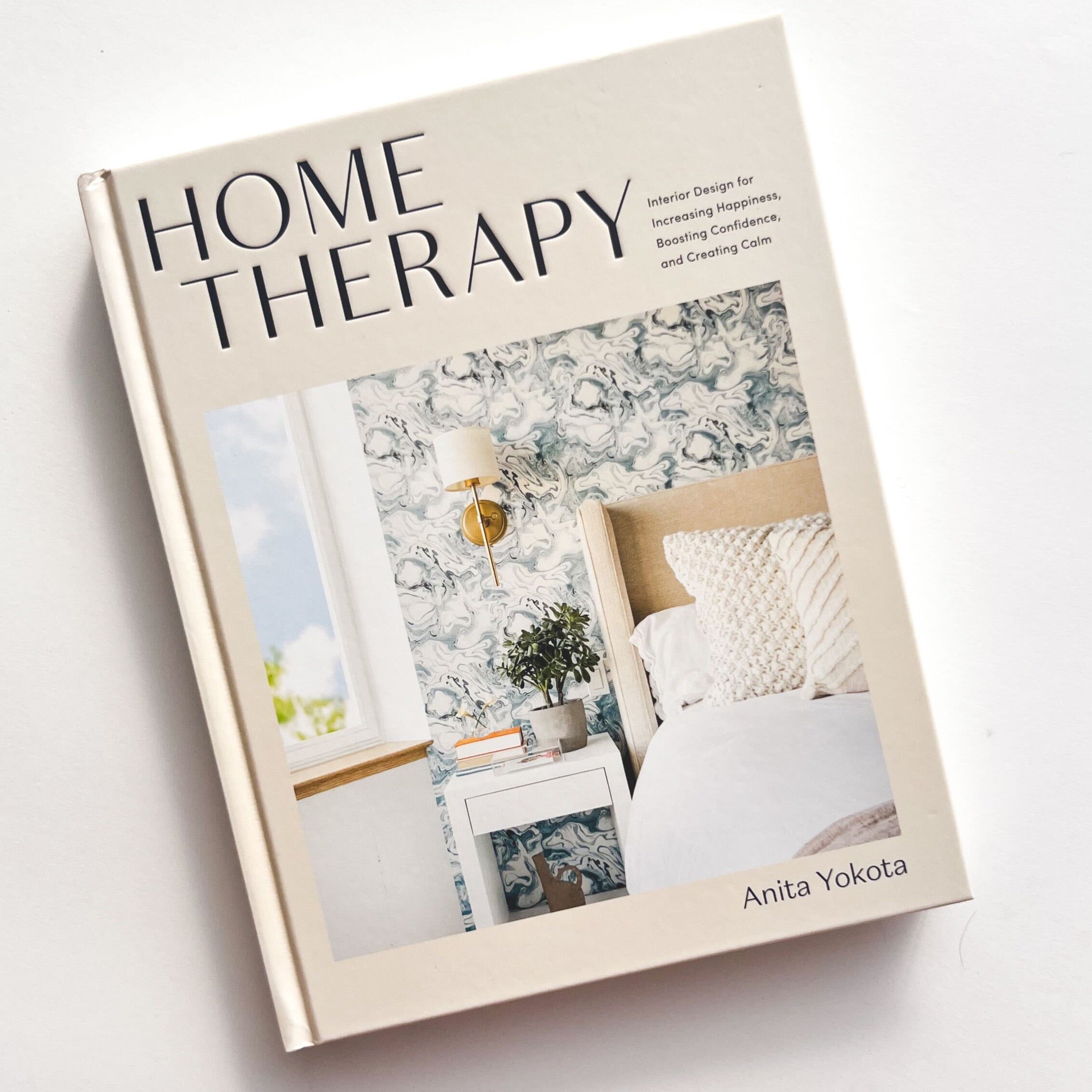 Home Therapy book cover with photo of bed with wallpaper