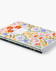 3 floral notebooks lying flat