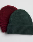 deep red and green knit beanies