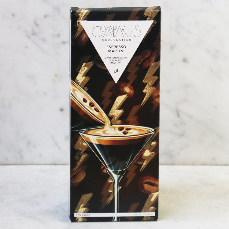Chocolate bar packaging with a martini glass design on a marble surface