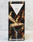 Chocolate bar packaging with a martini glass design on a marble surface