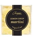 A close-up view of a clear box showcasing yellow bear-shaped gummy candies. The black and gold label on the front prominently reads "Chopin Lemon Drop Martini - Sugarfina."