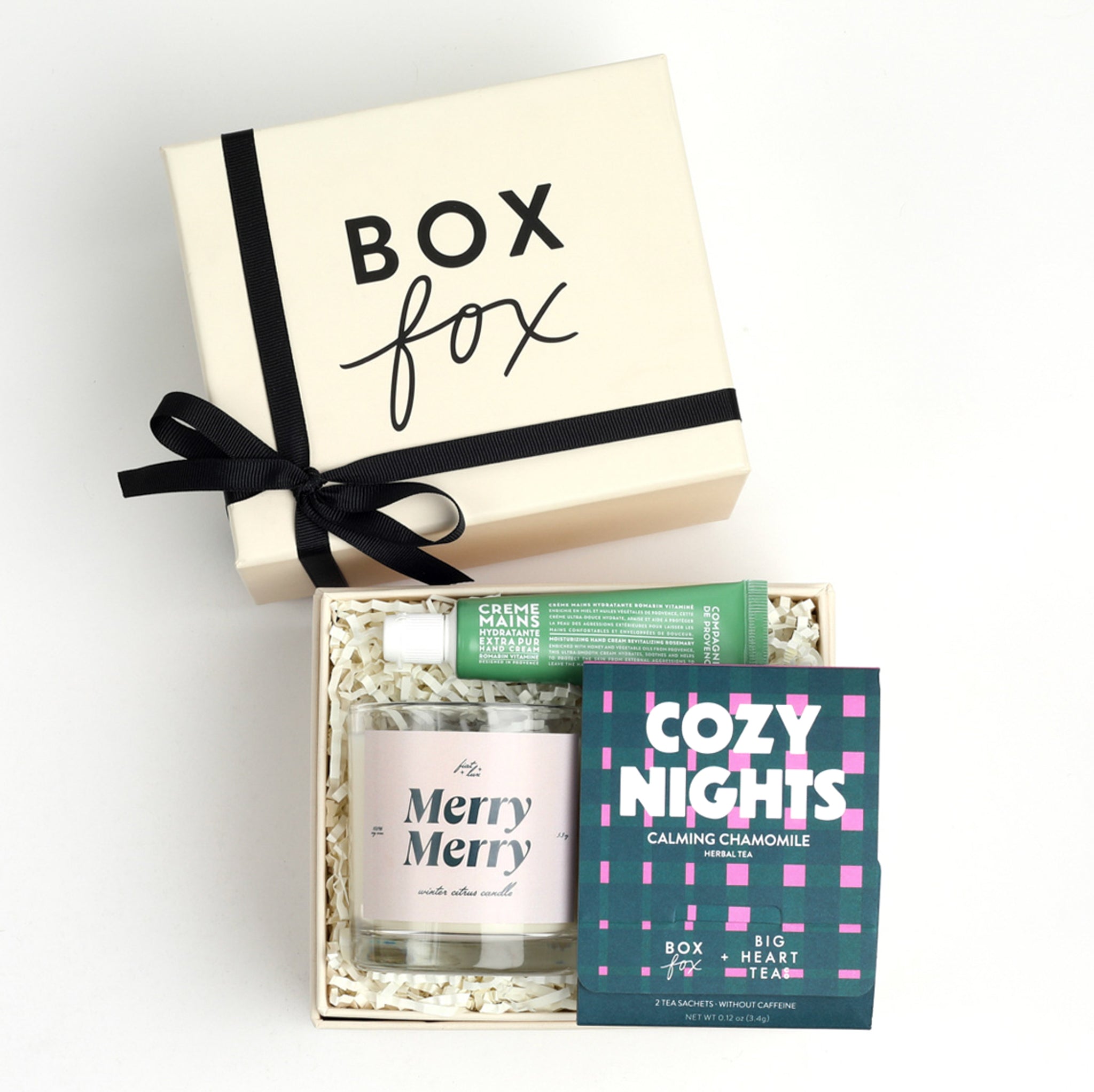 BOXFOX Mini creme gift box packed with rosemary hand creme, merry merry candle and cozy nights sachet tea
