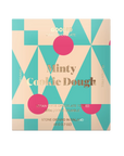 Pastel creme, blue, and pink geometric print on the front of the chocolate. Has gold text with chocolate name and ingredients 