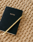 Black A6 Pocket Notebook with gold "NOTES" on the cover