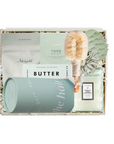 Skincare product set with 'Butter' branding in a box on a white background