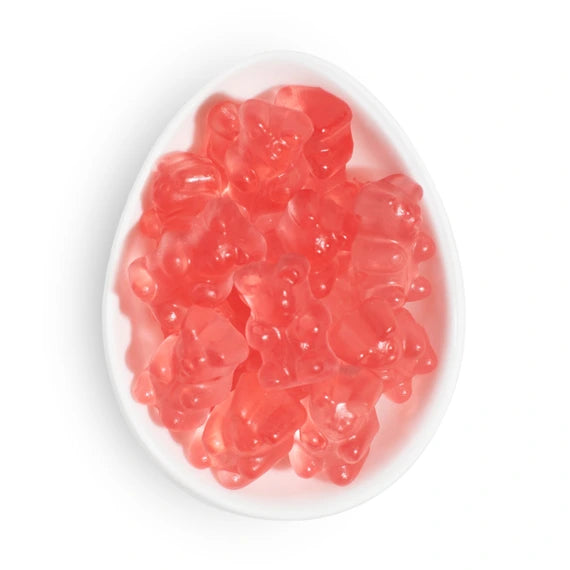 pink gummy bears in oval dish