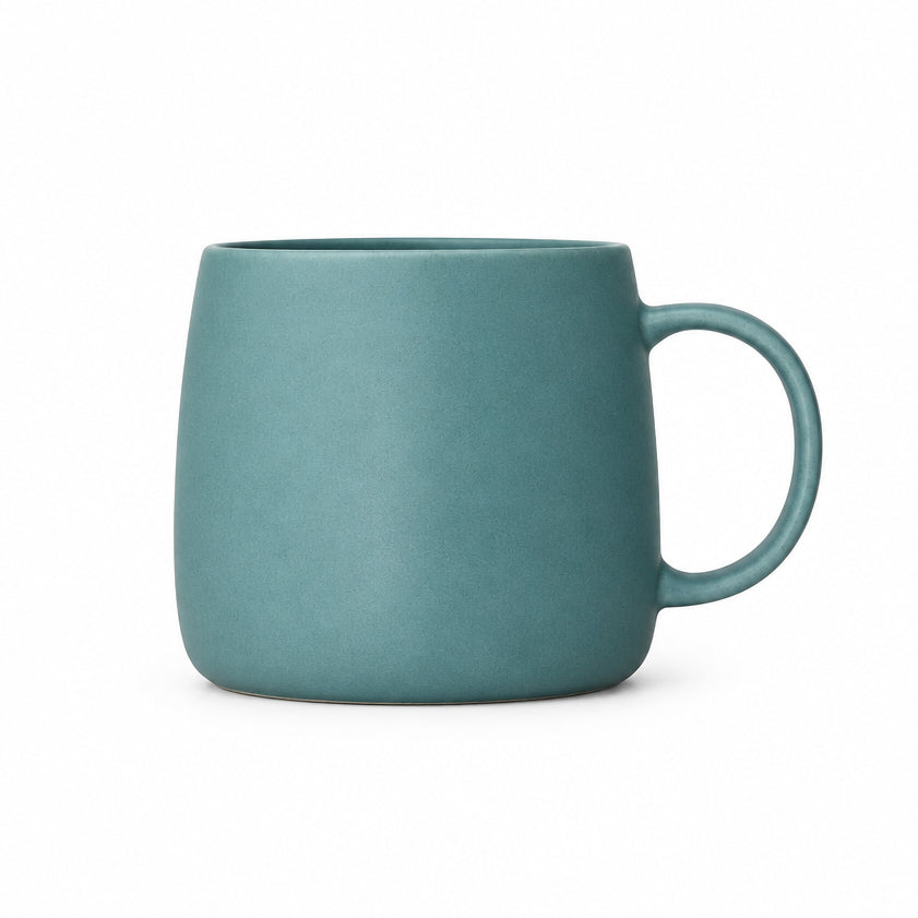 Blue mug on a wooden surface with a neutral background