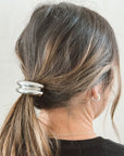 silver hair tie cuff in brown hair