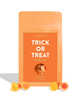 Orange 'Trick or Treat' candy mix package with gummy worms on a white background