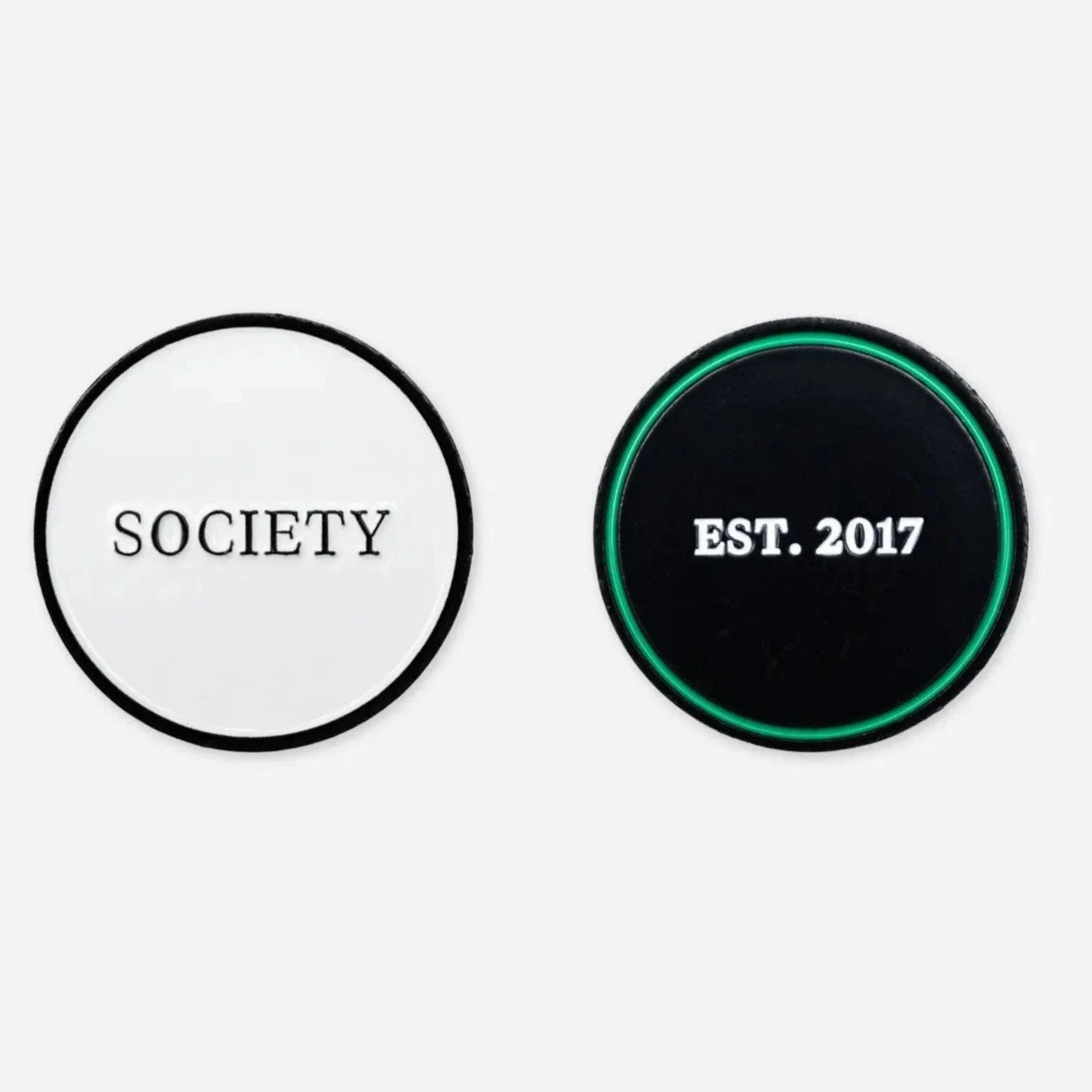 2 ball markers: 1 white with 'society' written on it in black, 1 black and green with 'est. 2017' written on it in white