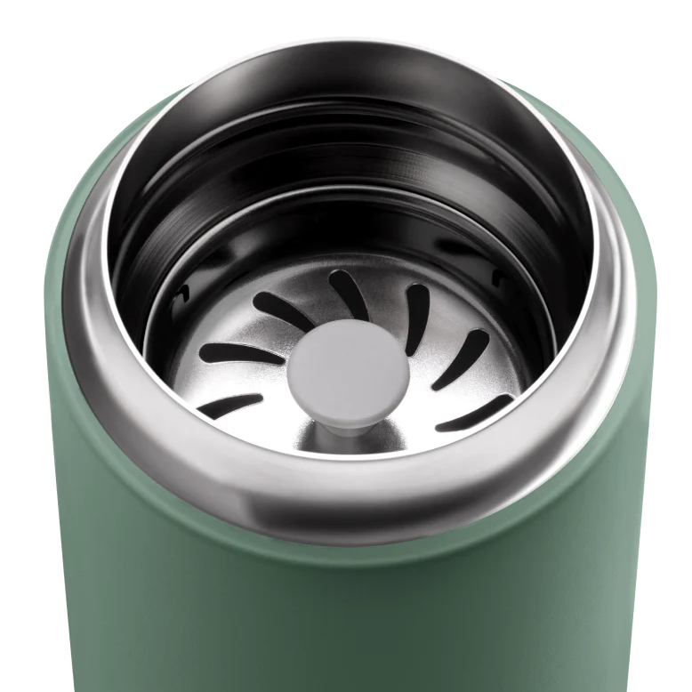 Green thermos with metal interior on a white background