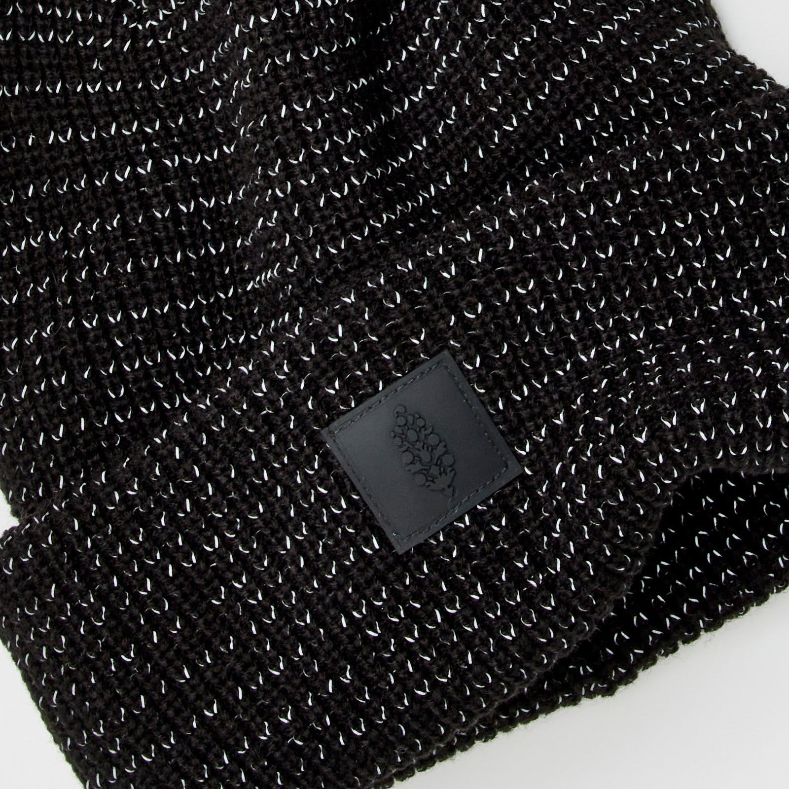Black fleece beanie close up